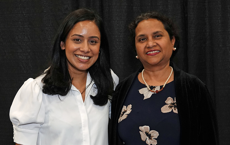This is an image of DEIB Committee members Komal Patel Murali and Nancy Dias at the 2024 Annual Assembly.
